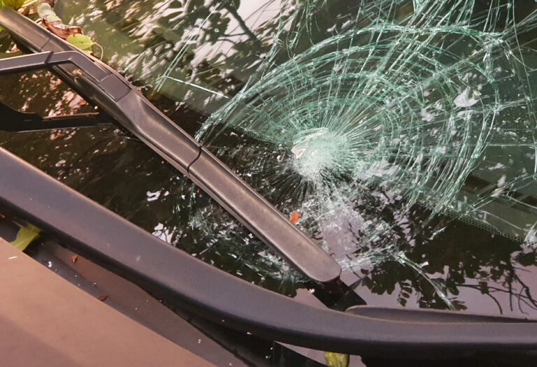 Heavily damaged windscreen requiring professional replacement