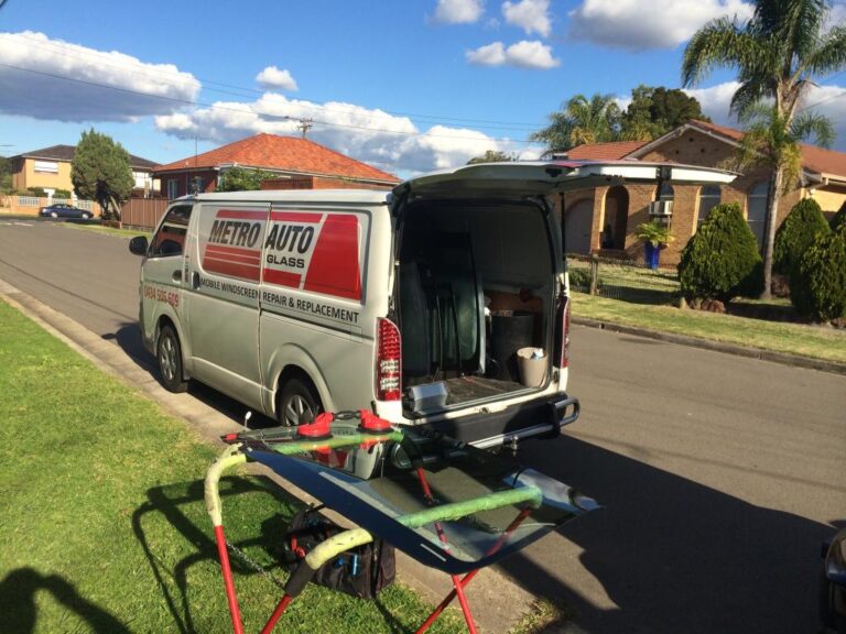 Mobile auto glass technician servicing an Audi in Sydney