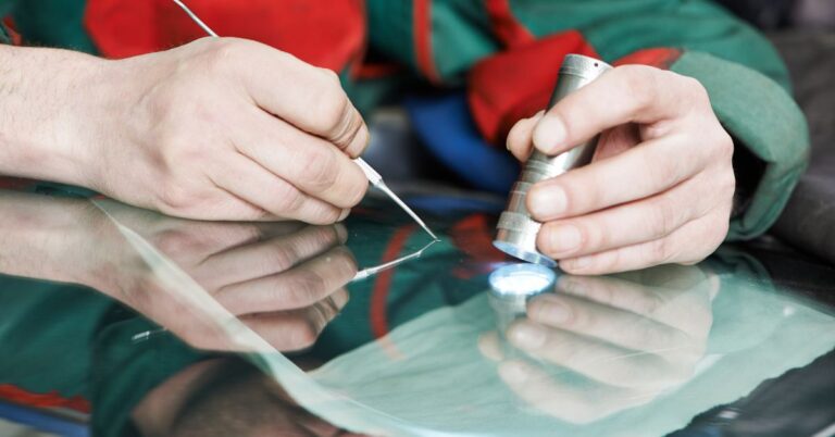 Mobile windscreen chip repair service at a customer's workplace