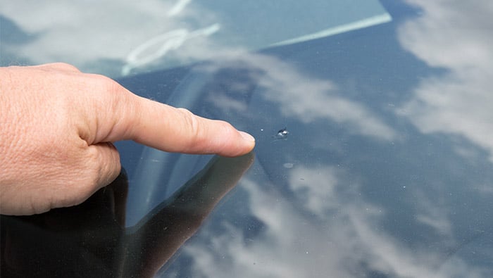 Close up of windscreen chip