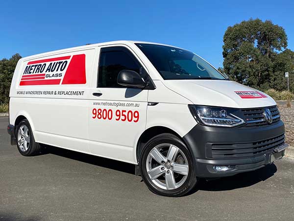 Certified technician arriving at a customers location to complete a camera calibration after windscreen replacement.